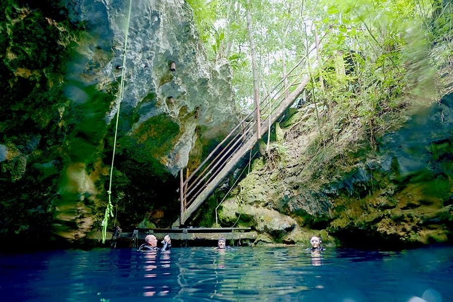 Uncover the Hidden Wonders of Cenote Dos Ojos‍ in Mexico